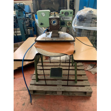 Máquina de poner forro giratoria